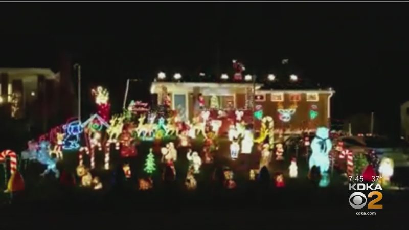 Family Fills Yard With Christmas Lights And Decorations